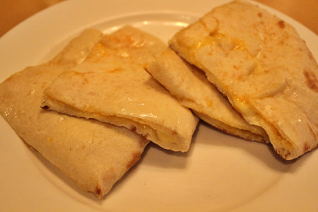 Indian cuisine: cheese naan (cut)