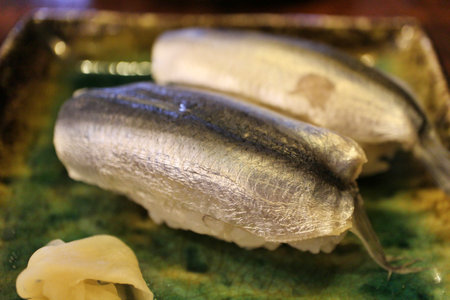 Japanese cuisine: mamakari (pickled Japanese sardinella) nigiri sushi in Kurashiki, Japanの写真素材
