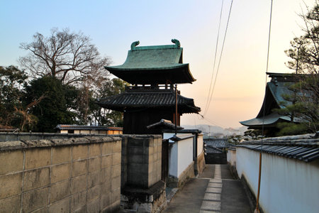 Dusk at bell tower of Mount Tsurugata in Kurashiki, Japanの写真素材