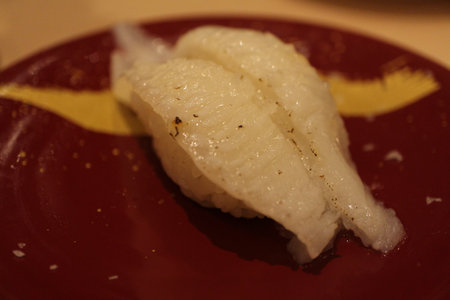 Japanese cuisine: grilled engawa (flounder belly) nigiri-zushi in Tokyo, Japanの写真素材