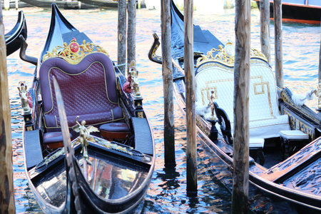 Gondolas moored on the Grand Canal in Venice, Italyの写真素材
