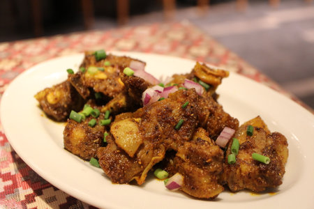 Nepalese cuisine: sukuti sadheko (dried mutton spicy salad)