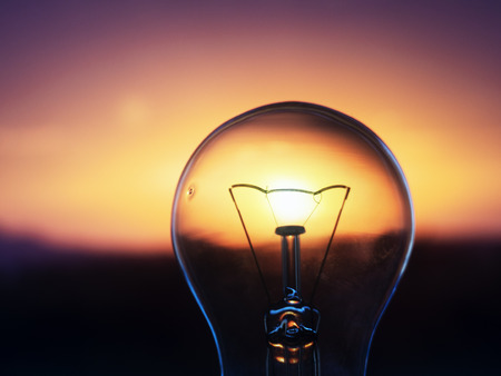 Sunset through the retro glow lampの写真素材