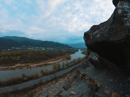 Mountain rift sky clouds landscape. Mountain cloudy sky over mountain rift panorama. Sunset mountain sky viewの写真素材