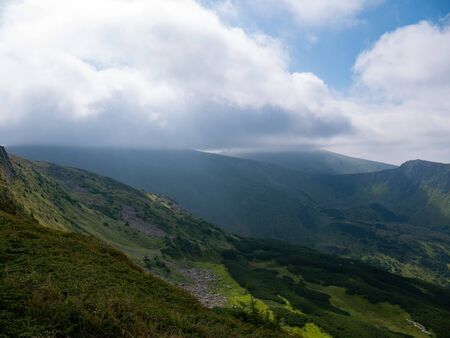 Mountain valley during sunrise / sunset. Natural summer landscape. Colorful summer landscape in the Carpathian mountains.の写真素材