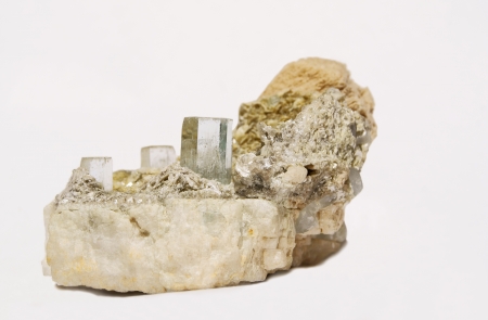 Three clear terminated aquamarine crystals on albite and muscovite specimen from Pakistanの写真素材