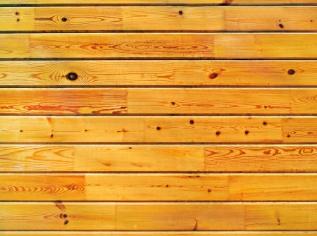 Wall of lateral wooden lining boards front view の写真素材