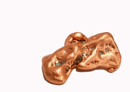 A piece of native copper on white backgroundの写真素材