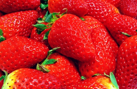Juicy tasty and sweet red strawberry backgroundの写真素材