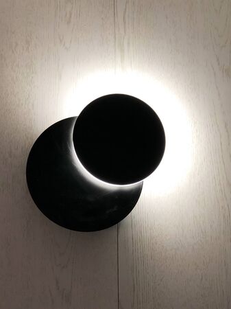 Black lamp consisting of two circles moon shapedの写真素材