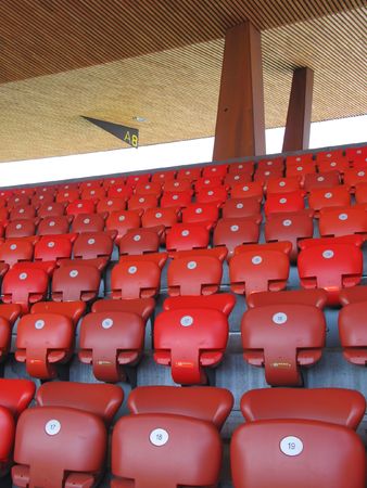 Red seats of Letzigrund stadium in Zurichの写真素材
