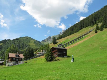 Mountain rail road in Muerren, famous Swiss skiing resort in Shilthorn region の写真素材