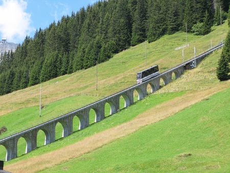 Mountain rail road in Muerren, famous Swiss skiing resort in Shilthorn region の写真素材