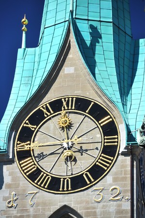 Ancient clock on top of Fraumunster church in Zurich