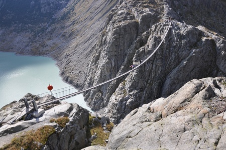 Trift Bridge, the longest 170m pedestrian-only suspension bridge in the Alps. Switzerland