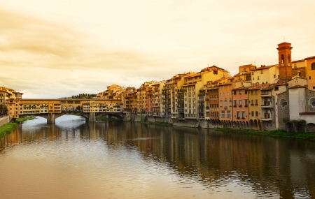 Ponte Vecchio bridge across Arno river in Florence, Italy の写真素材