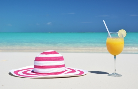 Hat and orange juice. Exuma, Bahamasの写真素材