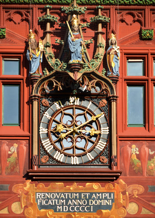 Clock on the wall of the city hall in Basel, Switzerlandのeditorial素材