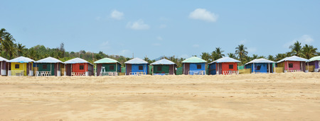 Colorful huts on Agonda beach. South Goa, Indiaの写真素材