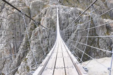 Trift Bridge, the longest 170m pedestrian-only suspension bridge in the Alps. Switzerland