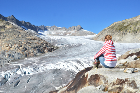 Traveler against Rhone glacier. Switzerlandの写真素材
