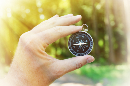 Compass in the handの写真素材