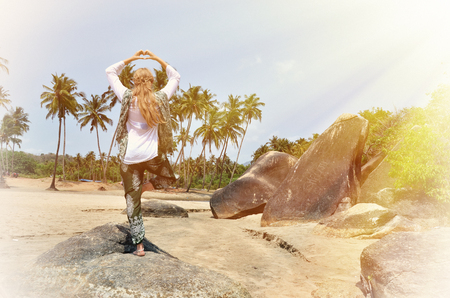Blond girl relaxing on Agonda beach of South Goa, Indiaの写真素材