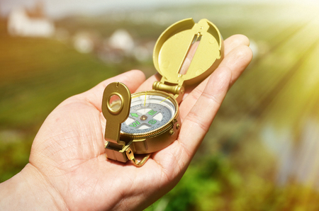 Compass in the handの写真素材