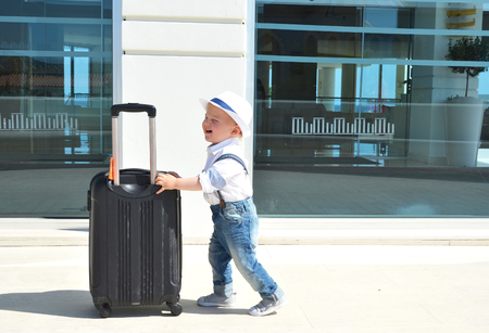 Young traveler with a suitcaseの写真素材