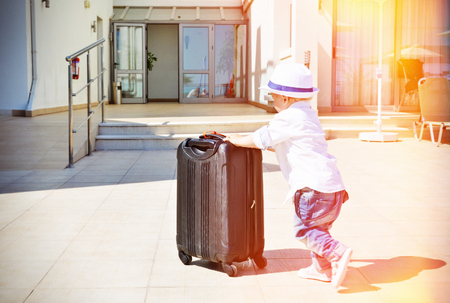 Young traveler with a suitcaseの写真素材