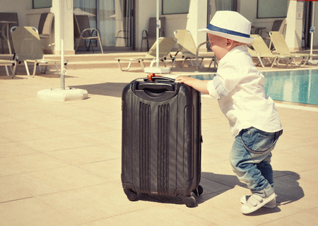 Young traveler with a suitcaseの写真素材