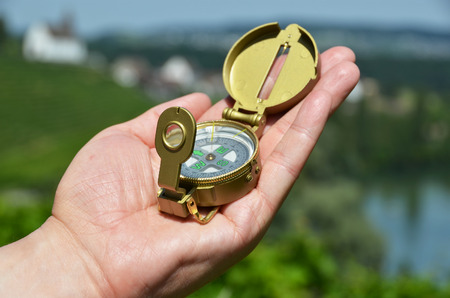 Compass in the handの写真素材