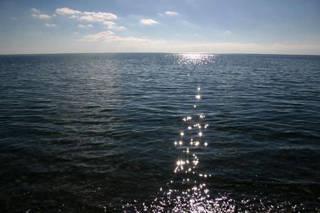 Sunset road on the calm Black sea. Russia.の写真素材