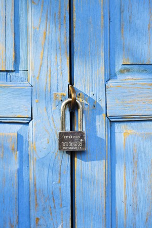 Locked blue door の写真素材