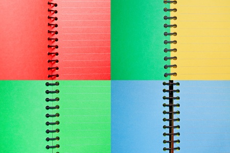 Set of color paper spiral notebooksの写真素材