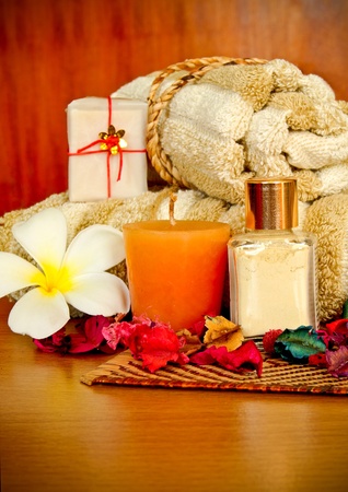 Spa products with flowers and towelの写真素材