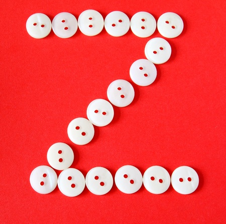 Letter "Z" from buttons on a red backgroundの写真素材