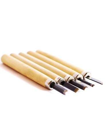wood carving tools on white background