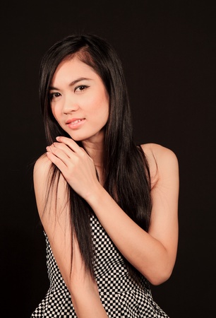 Beautiful asian woman with black background の写真素材