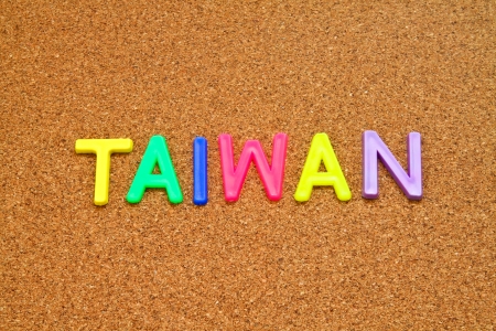 Taiwan in colorful toy letters on cork backgroundの写真素材