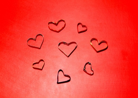heart shapes on red paper for valentineの写真素材
