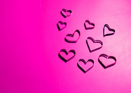 heart shapes on pink paper for valentineの写真素材