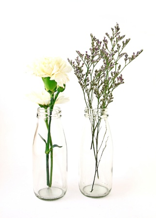 flowers in a bottle on white backgroundの写真素材