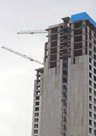 office building under construction in cloudy dayの写真素材