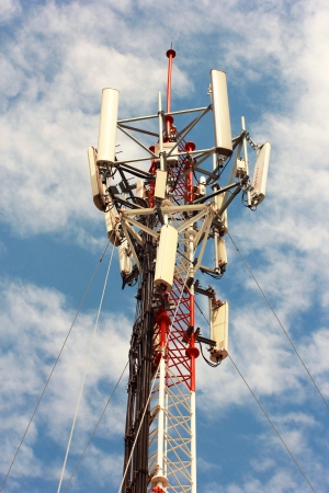 Top of telecom tower and blue sky の写真素材