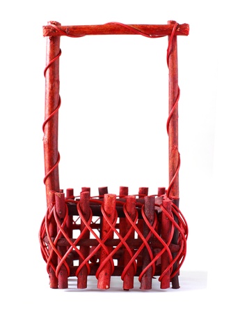 Empty wicker flower basket isolated on a white background の写真素材