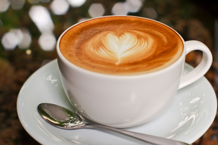 Cappuccino or latte coffee with heart shapeの写真素材