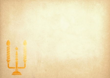 Vintage christmas card with candle on old paperの写真素材