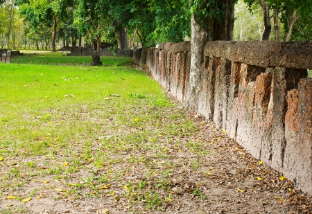 Stone block wall with in gardenの写真素材