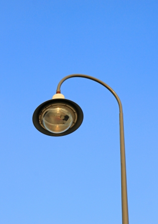 street light against a blue sky の写真素材